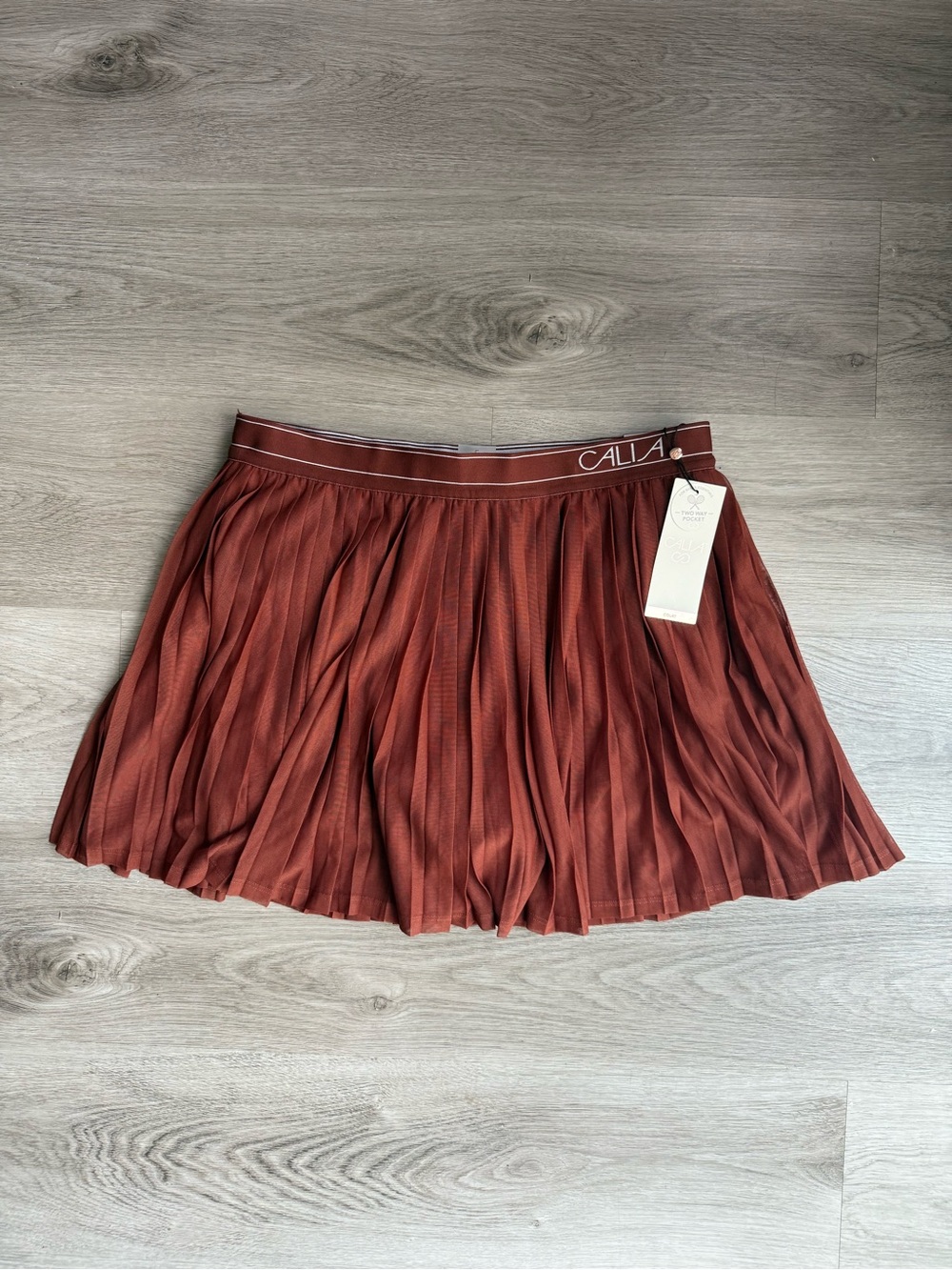 NWT CALIA High-Rise Pleated Mesh Skort L Rust Brown